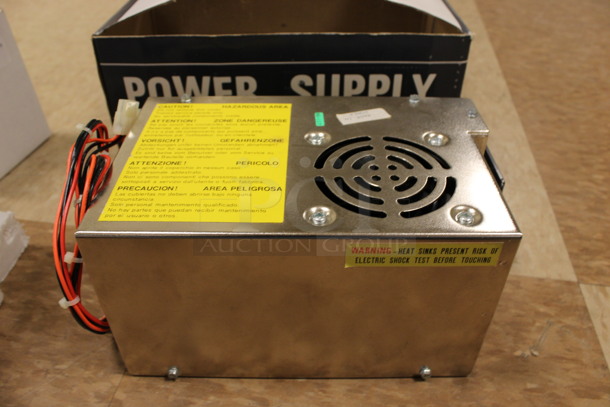 IN ORIGINAL BOX! Power Supply. 9x5.5x5.5. (Room 108)