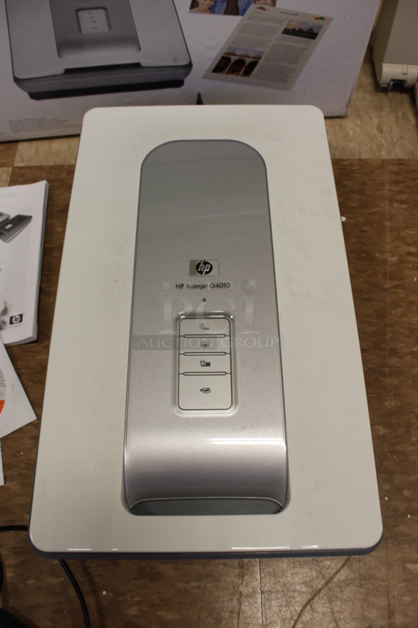 BRAND NEW IN BOX! HP Scanjet G4010 Countertop Photo Scanner. 20x10x3. (Room 108)
 - Image 1 of 6