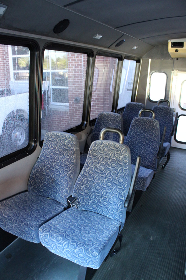2009 Ford Bus w/ 14 Individual Passenger Seats. Odometer Reads 74,689. VIN 1FDEE35S69DA66993. Title In Hand. Vehicle Runs and Drives! This Vehicle Has Been Sitting and Will Need It's Battery To Be Jumped. See Lot #2 For Additional Pictures. - Image 10 of 12