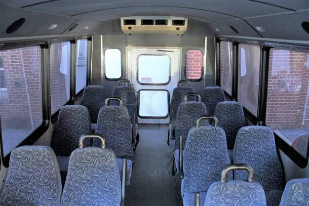 2009 Ford Bus w/ 14 Individual Passenger Seats. Odometer Reads 74,689. VIN 1FDEE35S69DA66993. Title In Hand. Vehicle Runs and Drives! This Vehicle Has Been Sitting and Will Need It's Battery To Be Jumped. See Lot #2 For Additional Pictures. - Image 12 of 12