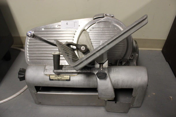 Hobart Model 1612 Stainless Steel Commercial Countertop Automatic Meat Slicer. 115 Volts, 1 Phase. 26x19x21. (Room 130)