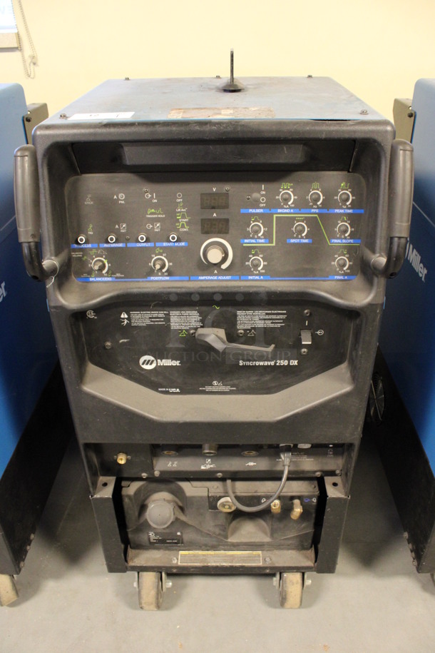 Miller Syncrowave 250 DX Metal Floor Style TIG Welding Machine on Commercial Casters. 115 Volts, 1 Phase. 28x42x50. (Room 130) - Image 1 of 7