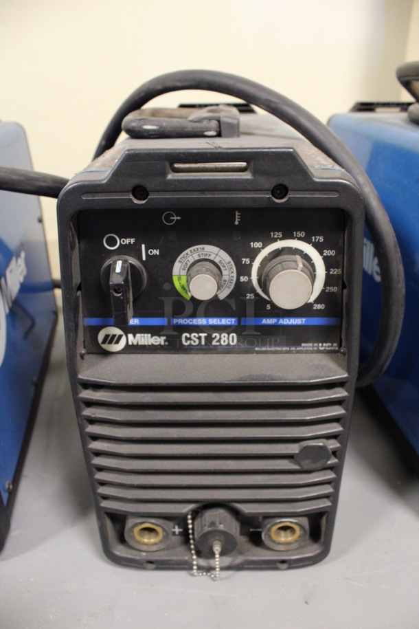 Miller Millermatic CST 280 MIG Wire Welder. 208-230/400-460 Volts, 1/3 Phase. 7.5x17.5x13. (Room 130)