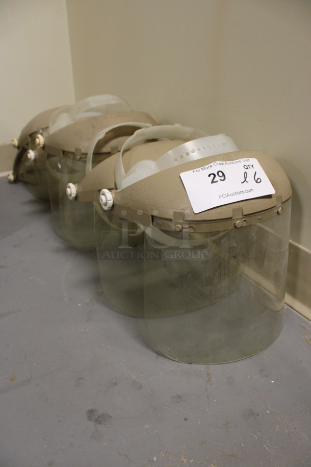 ALL ONE MONEY! Lot of 6 Clear and Tan Poly Masks! 10x7x10. (Room 130) - Image 1 of 3