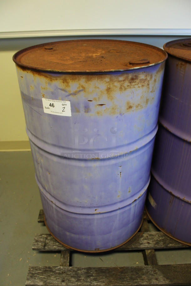 2 Metal Oil Barrels Full Of Liquid. Barrels Are Labeled as AW 46 Hydraulic Oil and ESL Gear Oil. 23x23x25. 2 Times Your Bid! (Room 130) - Image 2 of 6