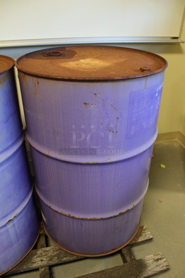 2 Metal Oil Barrels Full Of Liquid. Barrels Are Labeled as AW 46 Hydraulic Oil and ESL Gear Oil. 23x23x25. 2 Times Your Bid! (Room 130) - Image 3 of 6