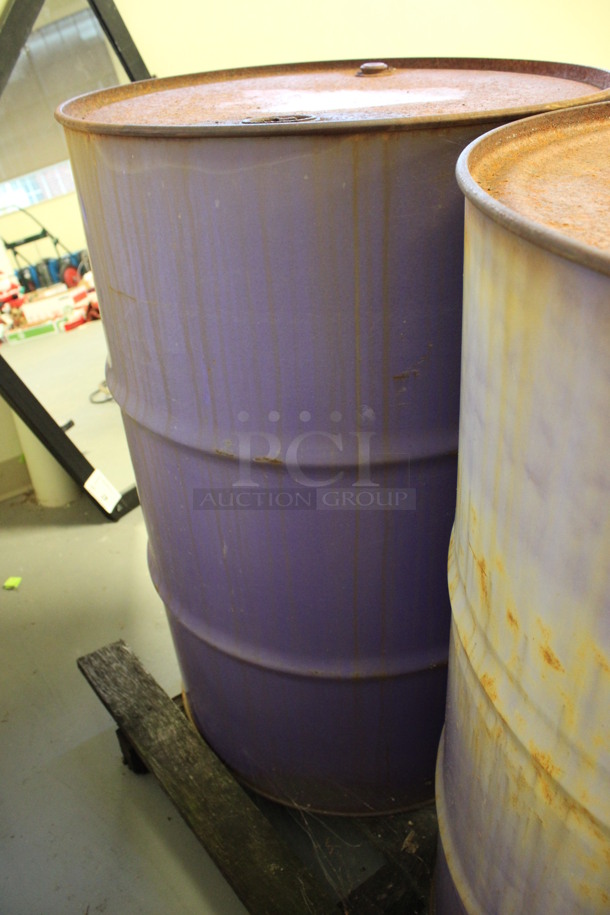 2 Metal Oil Barrels Full Of Liquid. Barrels Are Labeled as AW 46 Hydraulic Oil and ESL Gear Oil. 23x23x25. 2 Times Your Bid! (Room 130) - Image 5 of 6