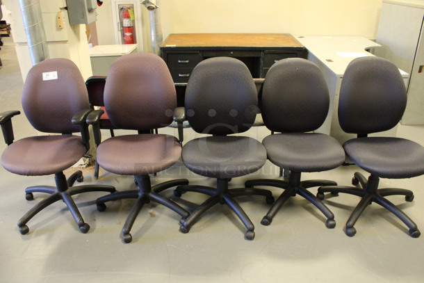 ALL ONE MONEY! Lot of 6 Various Office Chairs on Casters; 3 Purple and 3 Gray. Includes 23x21x39, 20x21x39. (Room 130)