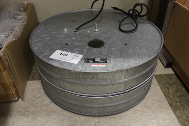 Model 1670 Metal Round Unit. 120 Volts, 1 Phase. 21.5x21.5x9. (Room 105)