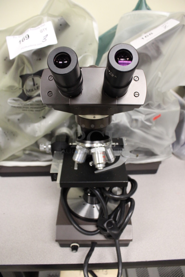 3 Swift Metal Countertop Microscopes w/ Covers. 6x9x16. 3 Times Your Bid! (Room 105)