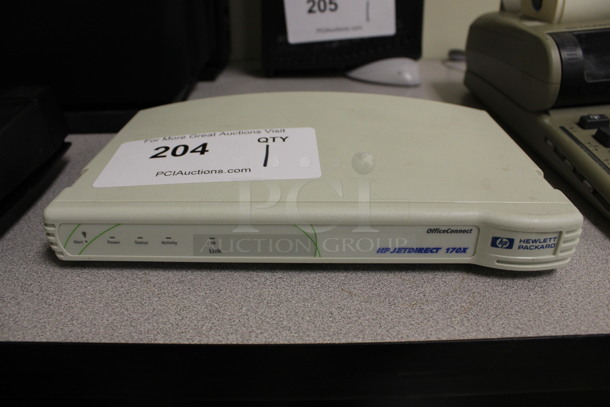 Hewlett Packard HP OfficeConnect HP Jetdrive 170X Printer Server. 9x5.5x1. (Room 105)