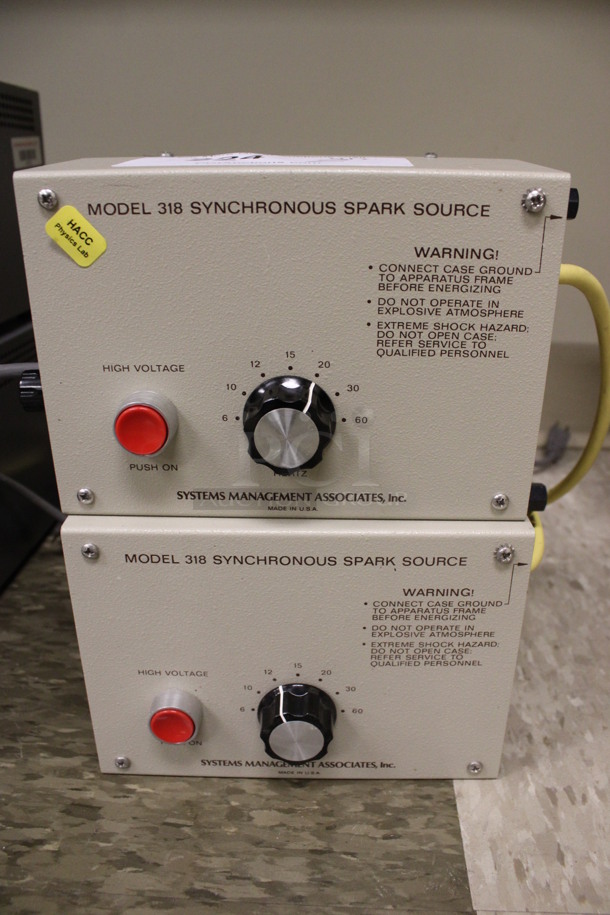 2 Systems Management Model 318 Synchronous Spark Source Boxes. 7x3x5. 2 Times Your Bid! (Room 105)