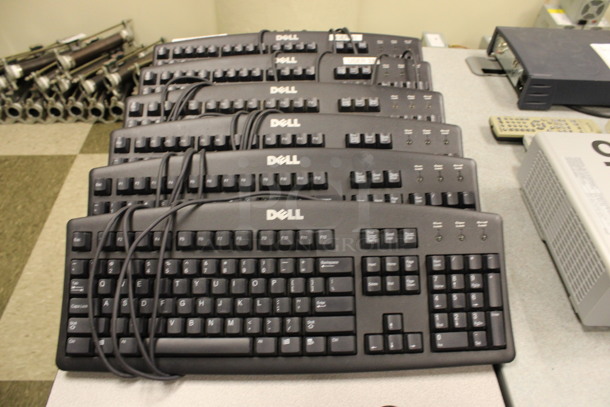 ALL ONE MONEY! Lot of 7 Dell Keyboards! 18x7x2. (Room 105)