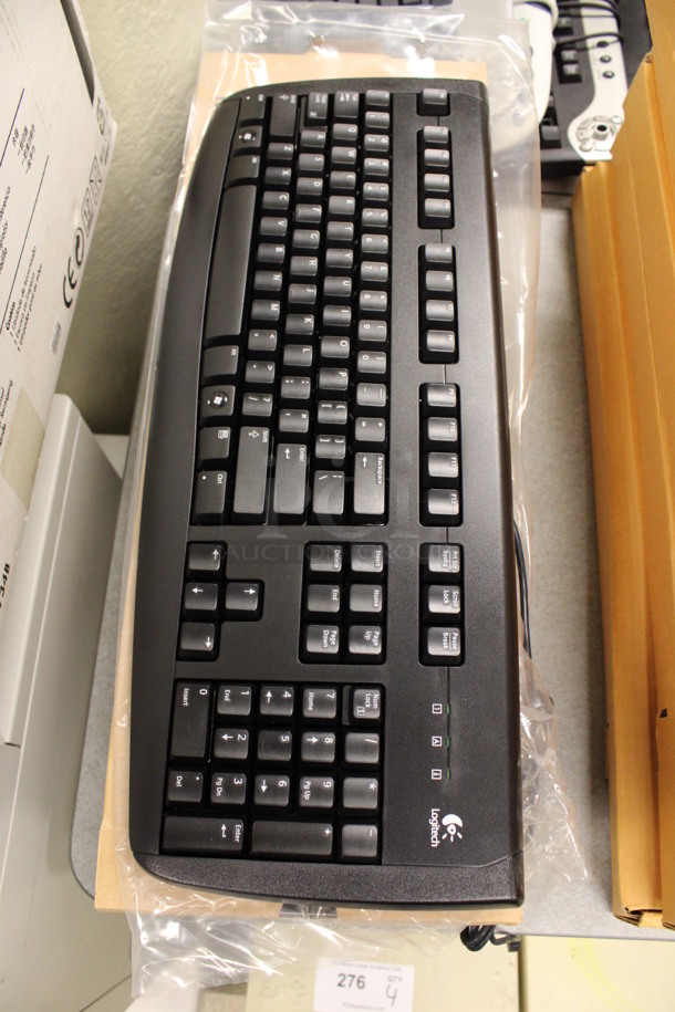 ALL ONE MONEY! Lot of 6 IN ORIGINAL BOX! Logitech Keyboards! 18.5x7x1.5. (Room 105)