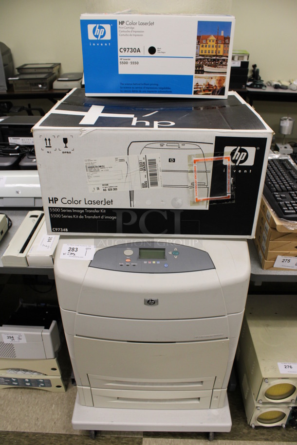 HP Color LaserJet 5550dtn Floor Style Printer w/ 2 Boxes of Ink. 25x28x36. (Room 105)