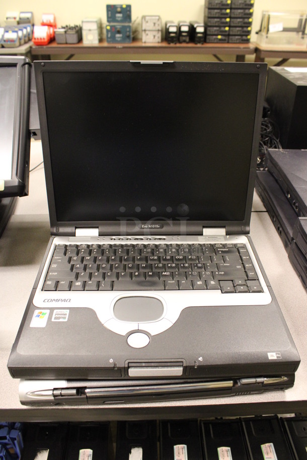 2 Compaq Evo N1015v 15" Laptops w/ 1 Charger. 13x10.5x2. 2 Times Your Bid! (Room 105) - Image 1 of 6