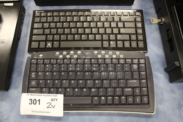 ALL ONE MONEY! Lot of 2 Keyboards! 12.5x6x1.5, 13x5x1. (Room 105)