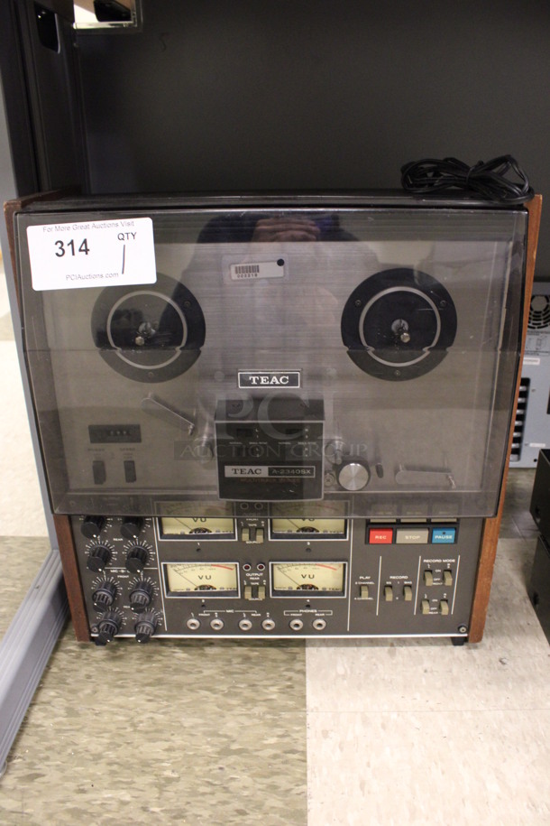 TEAC A-2340SX Multitrack Series Reel to Reel Tape Deck. 17x9x19. (Room 105)