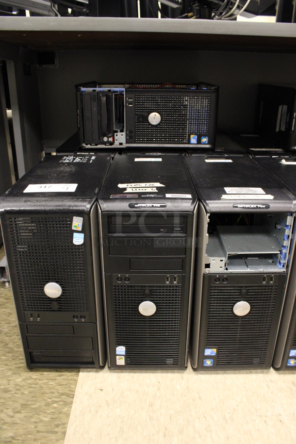 9 Dell Optiplex Computer Towers Including 745 and 780. 7.5x17x16. 9 Times Your Bid! (Room 105)