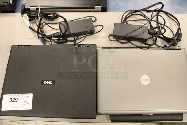 2 Various Dell 14" Laptops w/ 2 Chargers. Inspiron 7000 and Latitude D630. 13.5x10.5x1.5, 12.5x10x2. 2 Times Your Bid! (Room 105) - Image 5 of 8