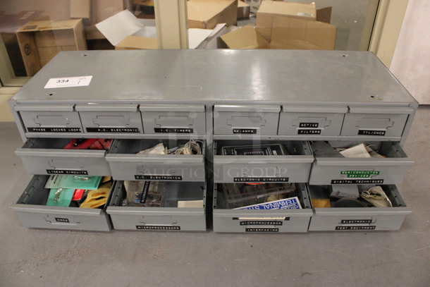 Gray Metal 14 Drawer Unit w/ Contents. 34x12x10.5. (Basement: Room 019) - Image 1 of 9