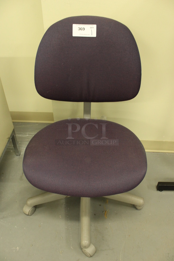 Purple Office Chair on Casters. 21x21x34. (Basement: Room 019)