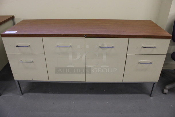 Tan Metal Counter w/ 4 Drawers, 2 Doors and Wood Pattern Countertop. 60x20x29.5. (Basement: Room 019) - Image 1 of 7