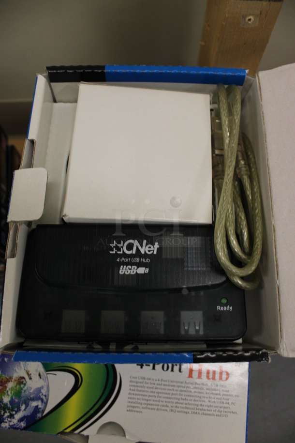 9 CNet 4-Port USB Hubs. 5x2.5x1. 9 Times Your Bid! (Basement: Room 019)
