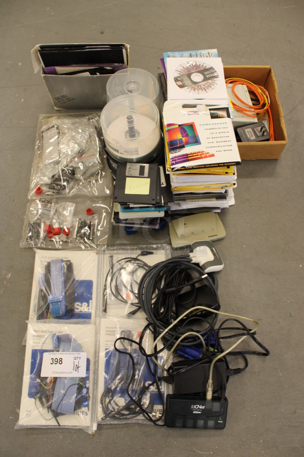 ALL ONE MONEY! Lot of Various Items Including 3Com Fiber Converter, Floppy Disks and CDs! (Basement: Room 019)