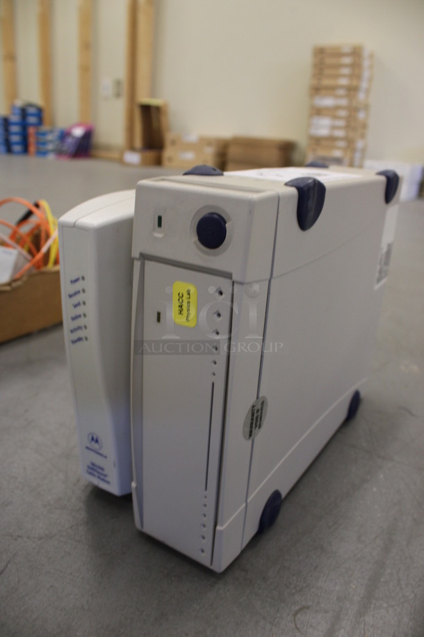 2 Various Items; Motorola Model SB4200 Cable Modem and Unit. 10x2.5x8, 2.5x8x7. 2 Times Your Bid! (Basement: Room 019) - Image 3 of 6