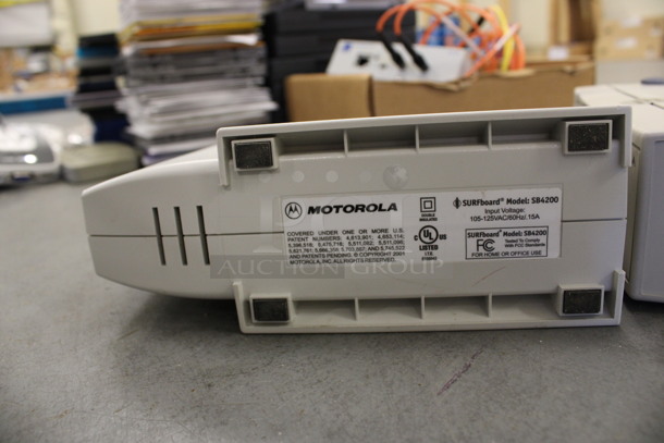 2 Various Items; Motorola Model SB4200 Cable Modem and Unit. 10x2.5x8, 2.5x8x7. 2 Times Your Bid! (Basement: Room 019) - Image 6 of 6
