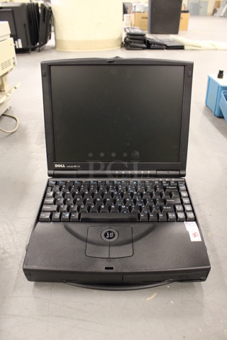 Dell Latitude XPi CD 12" Laptop. 11.5x15x3.5. (Basement: Room 019)