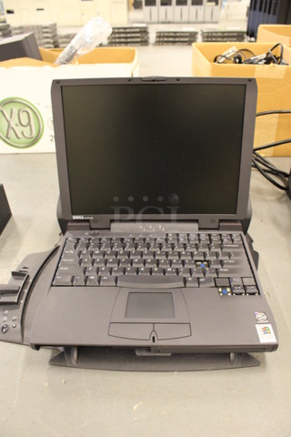 Dell 13" Latitude Laptop. 16x8x4. (Basement: Room 019)