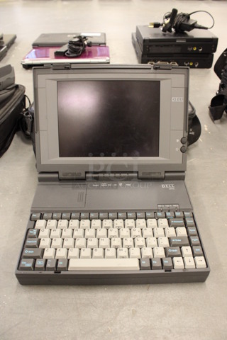 Dell 325NC 9" Laptop w/ Mouse in Soft Laptop Case. 13x25.5x12. (Basement: Room 019)
