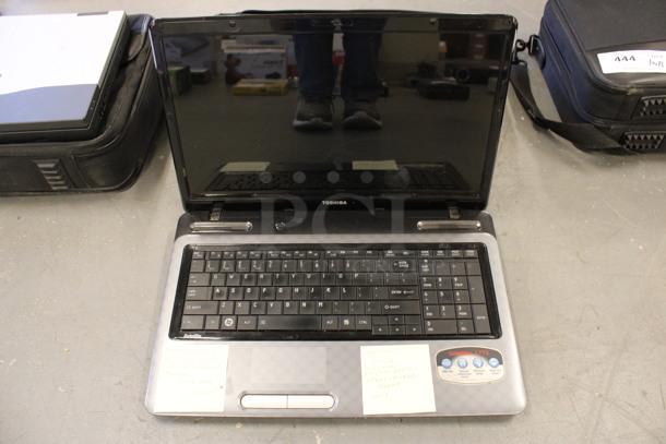 Toshiba Satellite L775D-S7107 17" Laptop in Soft Laptop Case. 17x13x5. (Basement: Room 019) - Image 1 of 6