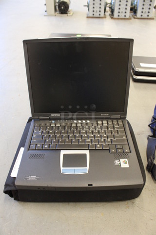 Compaq Evo N150 14" Laptop in Soft Laptop Case. 11x15x3. (Basement: Room 019)