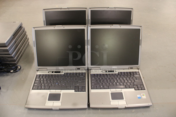 4 Dell Model PP11L Latitude D610 14" Laptops w/ 4 Chargers. 4 Times Your Bid! (Basement: Room 019) - Image 1 of 12