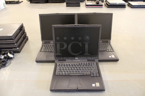 3 Dell Model PA-9/PP01X 15" Laptops w/ 3 Chargers. 3 Times Your Bid! (Basement: Room 019)