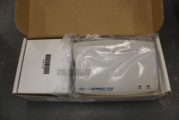 BRAND NEW IN BOX! HP Hewlett Packard Jetdirect 170X External Print Server. 7x4.5x1.5. (Basement: Room 019)