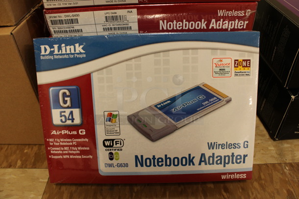 10 BRAND NEW IN BOX! D-Link Wireless G Notebook Adapters. 10 Times Your Bid! (Room 108)