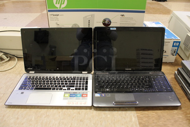 2 Various Toshiba Laptops Including Model PSJ2UU-003001. 15.5