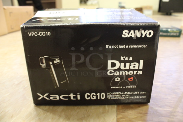 IN ORIGINAL BOX! Sanyo VPC-CG10 Dual Camera Xacti. 3x4.5x1.5. (Room 108)