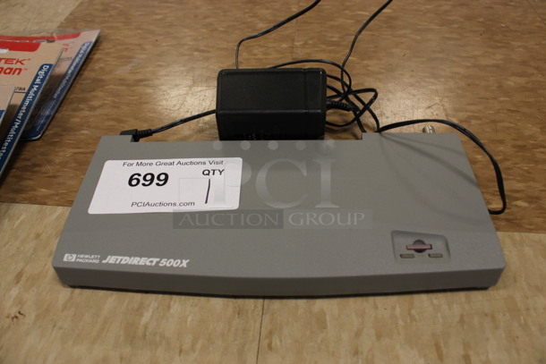 Hewlett Packard HP Jetdirect 500X External Drive. 11x5x1. (Room 108) 