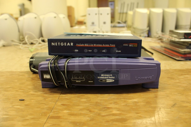 2 Various Items; Netgear ProSafe Wireless Access Point and Linksys Cisco Systems Broadband Router. 5.5x4x1, 6.5x5x1. 2 Times Your Bid! (Room 108) - Image 2 of 3
