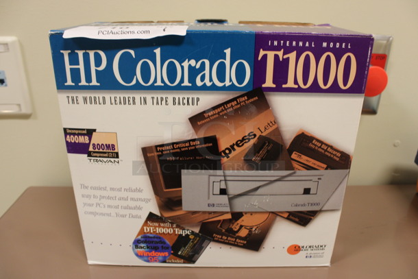IN ORIGINAL BOX! HP Colorado T1000 Tape Backup. 6x6x2. (Room 108)