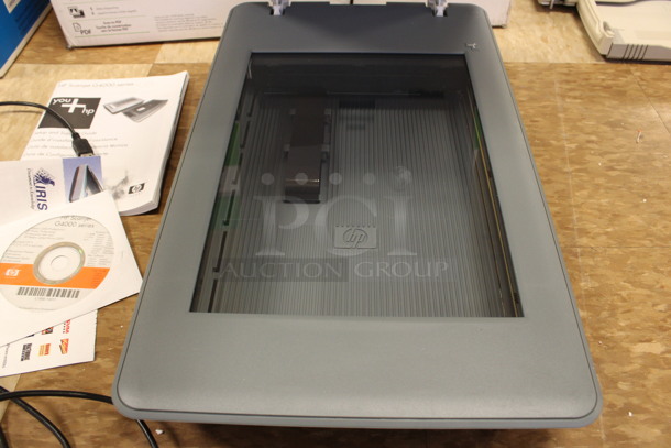 BRAND NEW IN BOX! HP Scanjet G4010 Countertop Photo Scanner. 20x10x3. (Room 108)
 - Image 4 of 6
