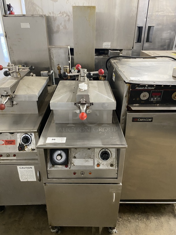 Henny Penny Stainless Steel Commercial Floor Style Electric Powered Pressure Fryer on Commercial Casters. 208 Volts, 3 Phase. 18x38x58 - Image 1 of 9