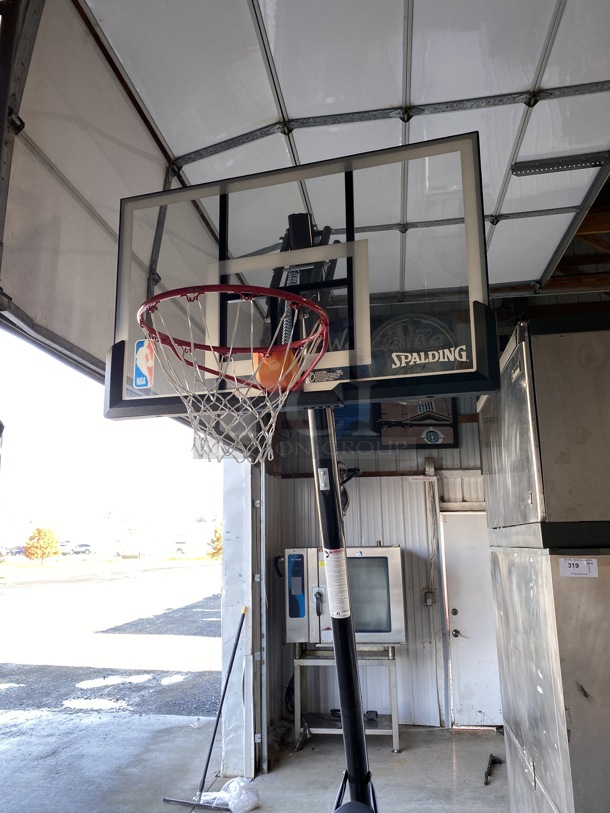 Spalding Metal Floor Style Portable Regulation Size Basketball Hoop w/ Ball Return Panel. Unit Is Less Than 1 Year Old! 34x50x114 - Image 3 of 5