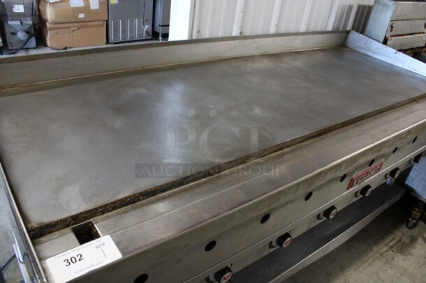 Vulcan Stainless Steel Commercial Natural Gas Powered Flat Top Griddle w/ Thermostatic Controls and Under Shelf on Commercial Casters. 72x32x38 - Image 3 of 7