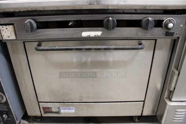 Southbend Model X436D-3G Stainless Steel Commercial Natural Gas Powered Flat Top Griddle w/ Oven and Backsplash on Commercial Casters. 36x34x60 - Image 2 of 6